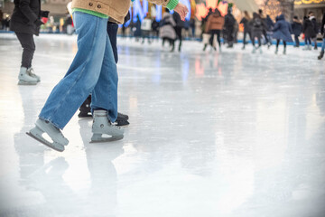 Toronto Ontario, Canada-December 12th, 2023: Skates on the ice at Toronto City Hall’s Nathan...