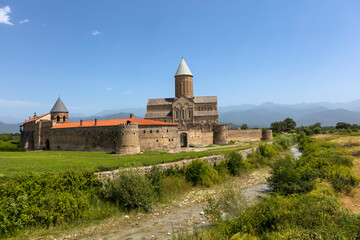 Fototapeta na wymiar Georgia Alaverdi monastery on a sunny autumn day