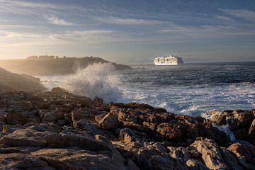 Navigating Galicia: A Cruise Ship's Voyage Past Rugged Shores