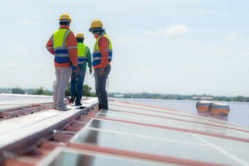 engineer men inspects construction of solar cell panel or photovoltaic cell by electronic device....