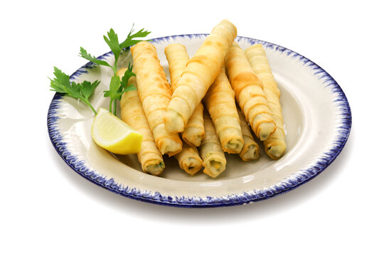 Sigara borek, Cigar-like Turkish spring rolls.
A dough sheet called yufka wrapped with cheese filling and fried.