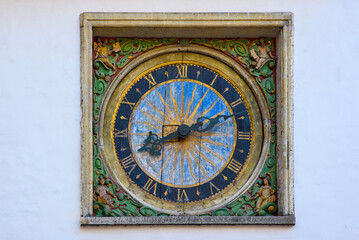 Fototapeta na wymiar Old wooden clock of the Church of the Holy Ghost , Tallinn, Estonia