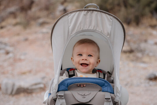 Smiling Baby in hiking backpack