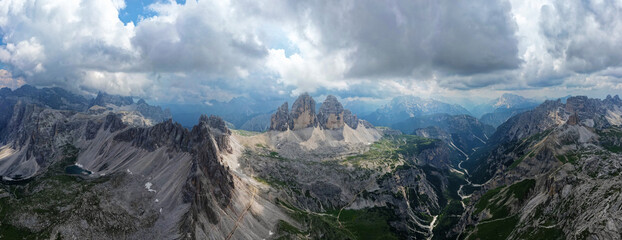 Aerial panoramic view of Tre Cime di Lavaredo mountain in the Dolomites, Italy. Dramatic and cinematic landscape. very famous places for hiking and rock climbing.