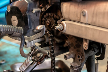 Repairing motorcycle machine part of motorcycle engine overhaul.