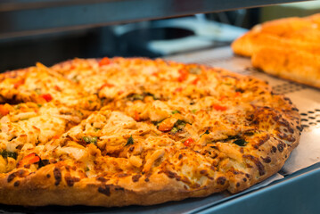 Pizza with cheese and pepperoni with pepper