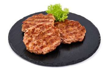 Roasted meatballs with spices, isolated on white background.