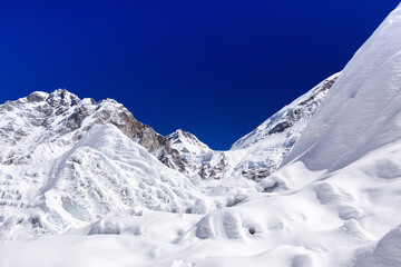 Khumbu Glacier and snowy mountains under pristine snow in Everest base camp. Himalayas. Nepal.