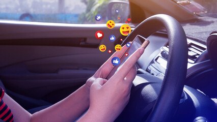 Social media and online digital concept, woman using smart phone sending emojis with social media...