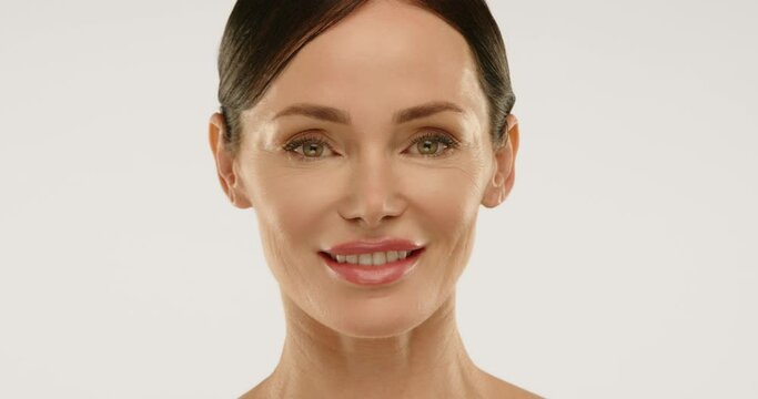 Adult actress promotes skin care cream. She is an example that aging can be halted by using quality skincare products. Stop aging with high quality skincare. High quality 4k footage.