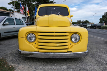 Retro yellow car at french street