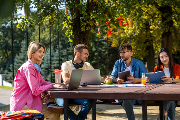 Friends studying together and feeling happy