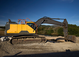 Excavator heavy machine construction. Photo color