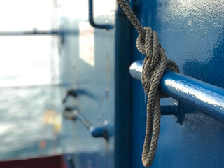 Closeup view of the rope tied on to the rod