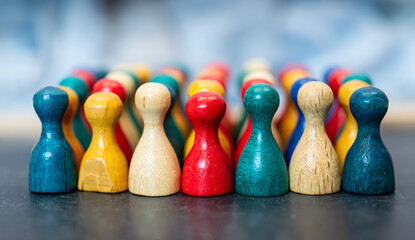 Diversity team concept with wooden pawns in line
