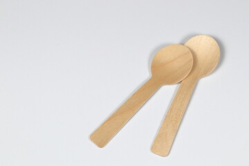 Wooden spoon, disposable tableware, Eco-friendly materials spoon isolated on white background. 