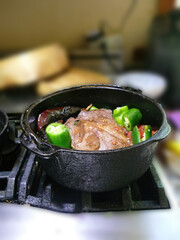 Braised beef pot roast with  jalapenos and Mexican chilis .