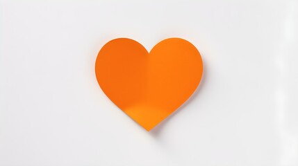 Orange Paper Heart on a white Background. Romantic Template with Copy Space