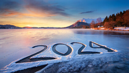 2024 written on the frozen lake, beautiful winter mountain landscape. - obrazy, fototapety, plakaty