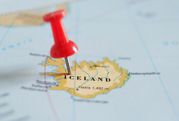 Red push pin in a map of Iceland