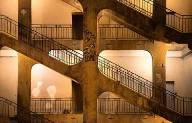 The stairs of the famous Cour des Voraces, old Lyon. Historic Staircase with Graffiti in Lyon.