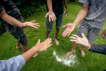 hompimpa, black and white palms for drawing turns in Indonesian children's games. Hompimpa is a way...