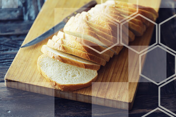 Slices white bread in plate on vintage wooden table with copy space