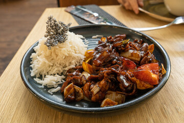 Japan Curry, Beef and Vegetables Stir Fry with White Rice, Teriyaki Beef on Restaurant Plate