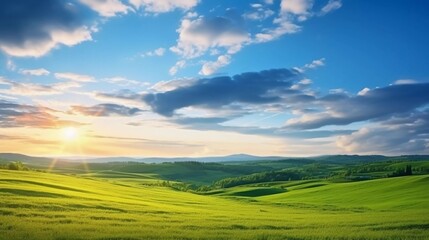 Obraz premium beautiful green meadow at sunrise in summer, colorful morning landscape wide panorama