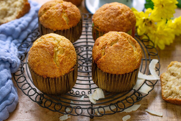 Sweet banana bread muffins with shredded coconut - 695087641