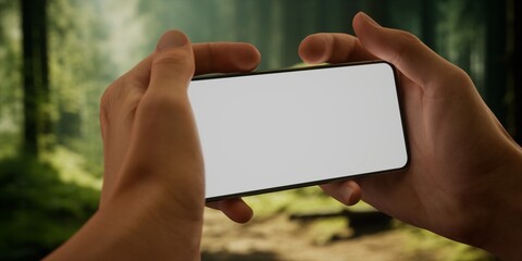 CU Man using his phone outdoors in the forest during hiking or camping trip