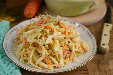 Traditional cabbage salad Coleslaw with carrots and mayonnaise dressing - 695091414