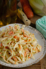 Traditional cabbage salad Coleslaw with carrots and mayonnaise dressing - 695091419