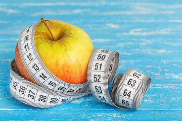 apple and measuring tape weight loss diet