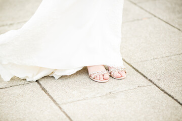 Bridal open toe shoes on concrete