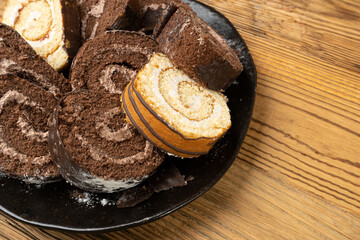 Chocolate Swiss Roll, Round Sponge Cake, Sliced Rolled Vanilla Biscuit with Cocoa Cream Filling