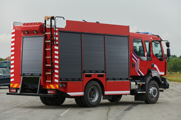 In this captivating scene, a state-of-the-art firetruck, equipped with advanced rescue technology,...