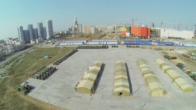 Military base with tents and machines for Victory Day Parade