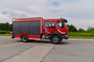 In this captivating scene, a state-of-the-art firetruck, equipped with advanced rescue technology,...