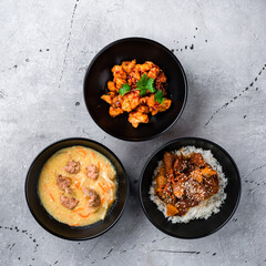 Spicy chicken fillet, soup with noodles and pork with basmati rice and pineapple.