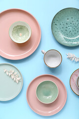 Beautiful table setting on blue background