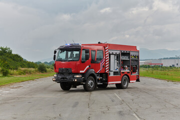 In this captivating scene, a state-of-the-art firetruck, equipped with advanced rescue technology,...