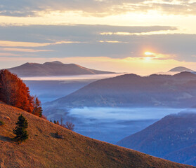 Morning fog in autumn Carpathian.