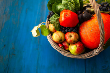 Basket Full of Antioxidants, Electrolytes and Vitamins on Blue Table