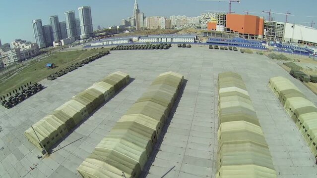 Military base with tents and machines for Victory Day Parade