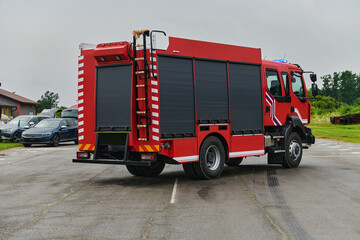 In this captivating scene, a state-of-the-art firetruck, equipped with advanced rescue technology,...