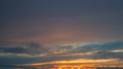 Beautiful sky background - Sunset Sunrise sky with light clouds and real sun.
