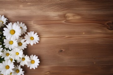 Automnal flat lay with white daisies on dark wooden background. Copy space