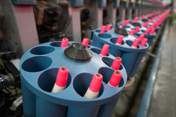 The mechanical equipment in the winding workshop is located in a spinning factory