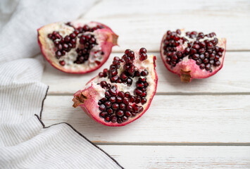 Fresh Opened Pomegranate on Light Colored Plate